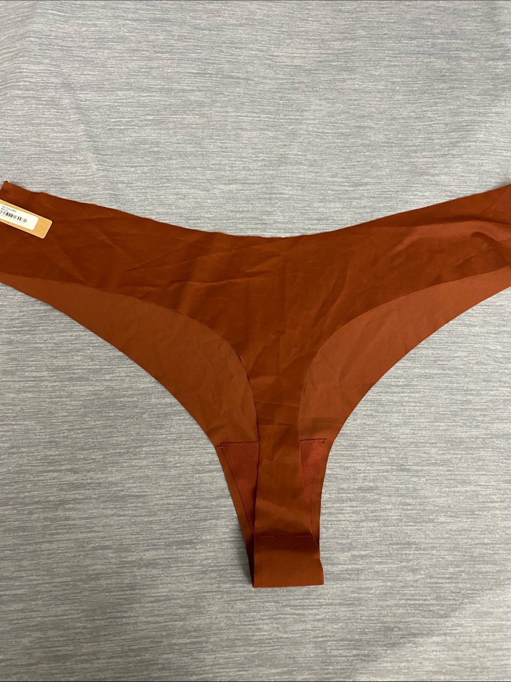 3/$30 SKIMS Seamless Thong Panty in Rust - Picture 4 of 4